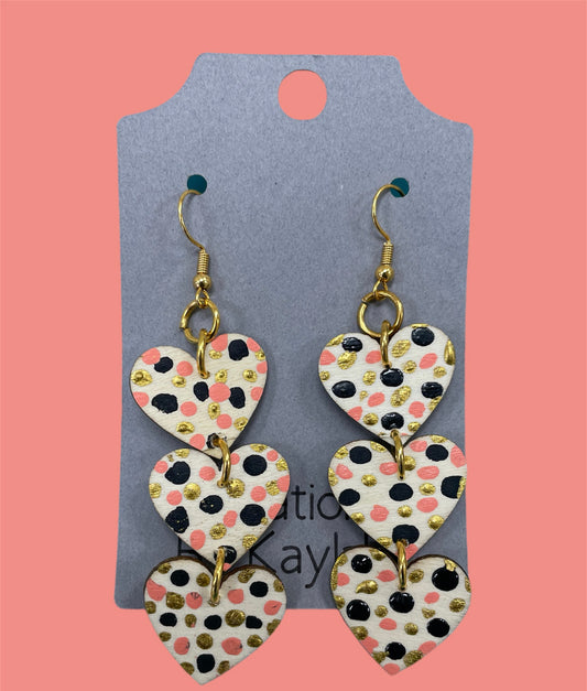 # 243 pink with gold heart earrings