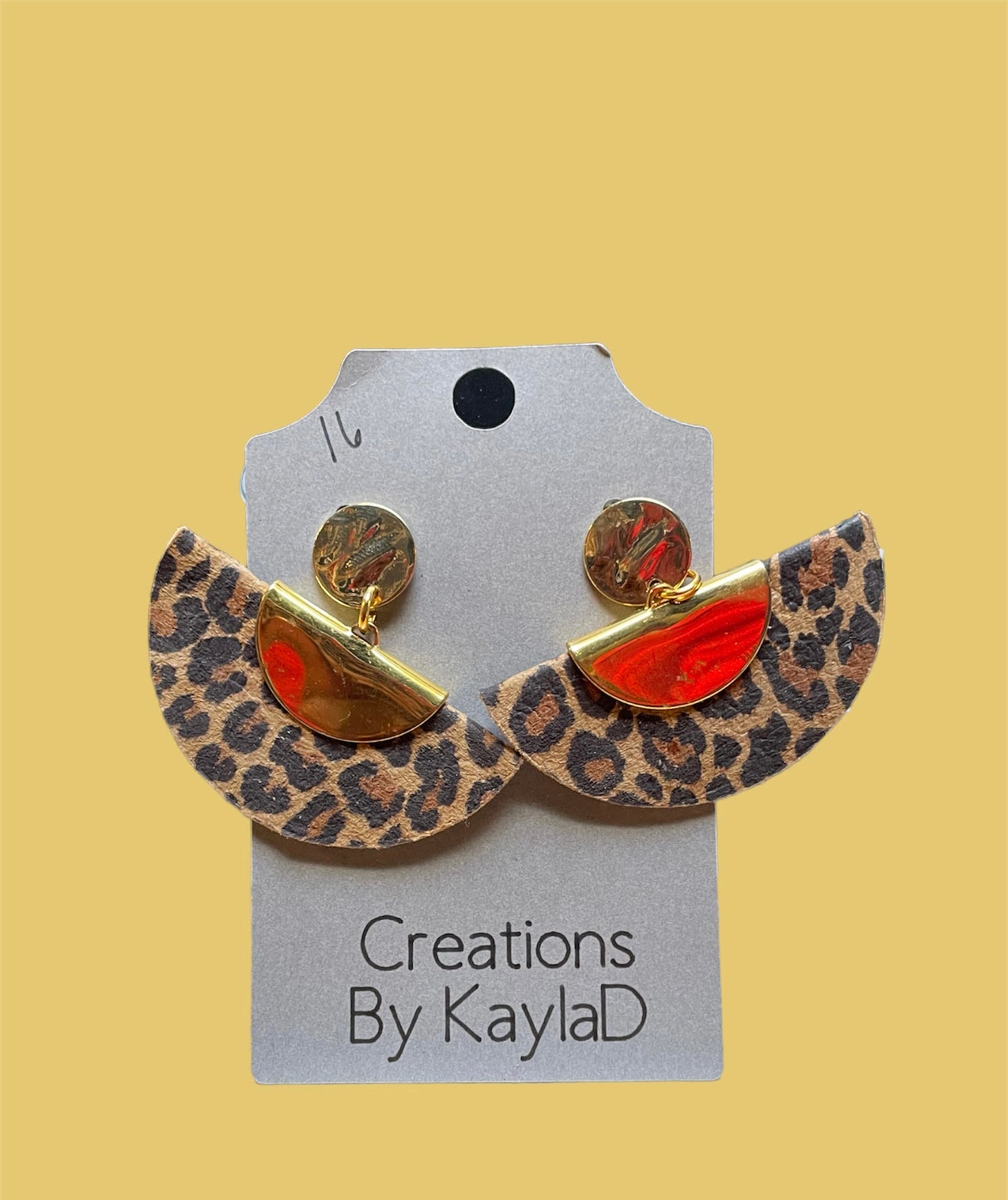 #228 gold metal and leather cheetah print earrings