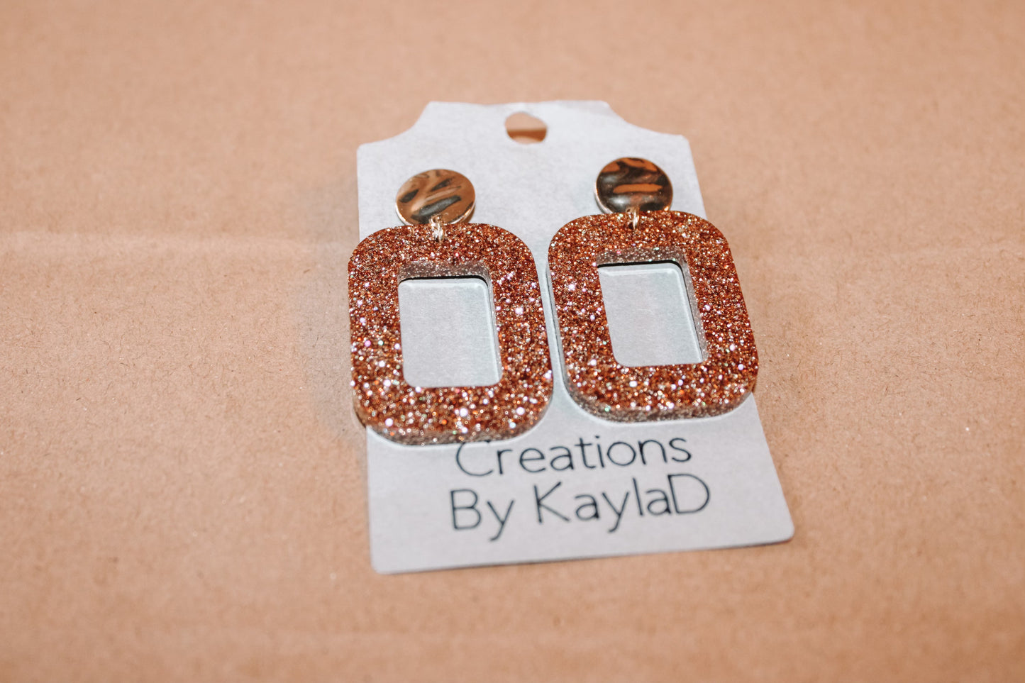 # 65 open square gold-gold post earrings